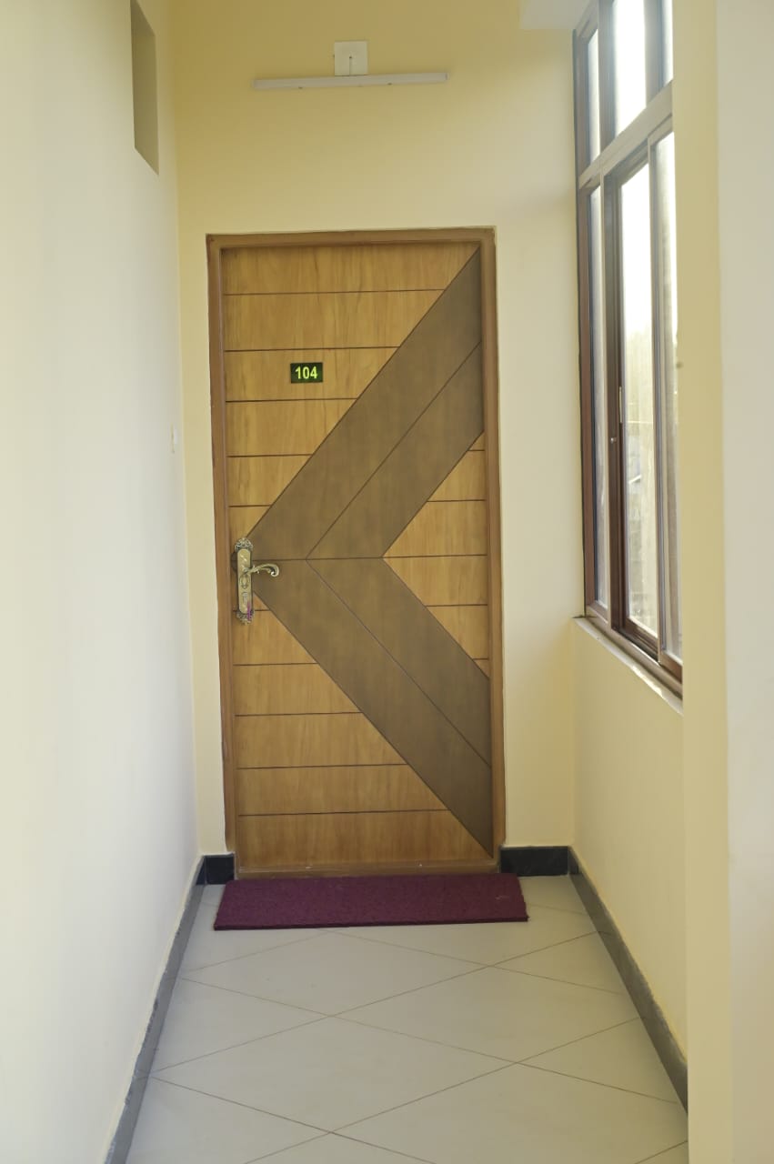 Suite 104 Entry Door at Malpe Manor